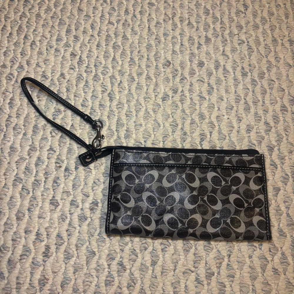 Y2K coach wristlet with logo and blue satin interior